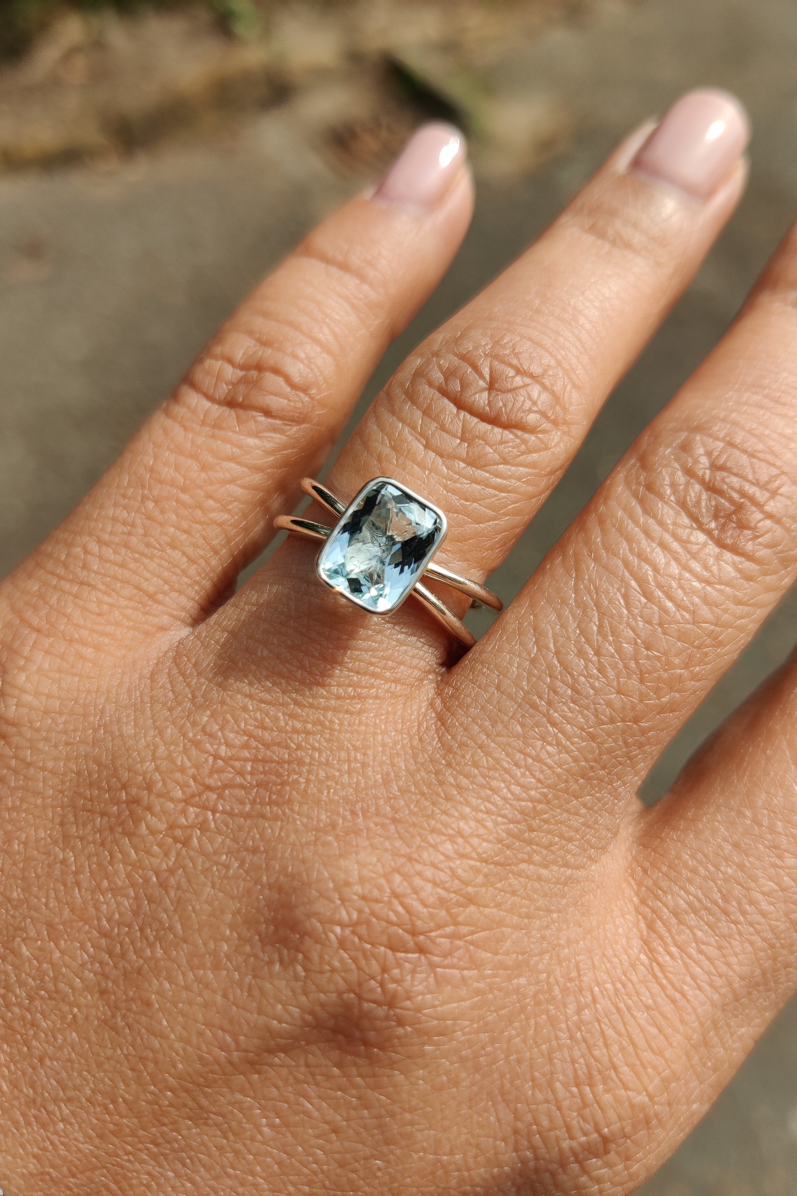 Emerald cut aquamarine ring & 4 baguette diamonds - Holloway Diamonds